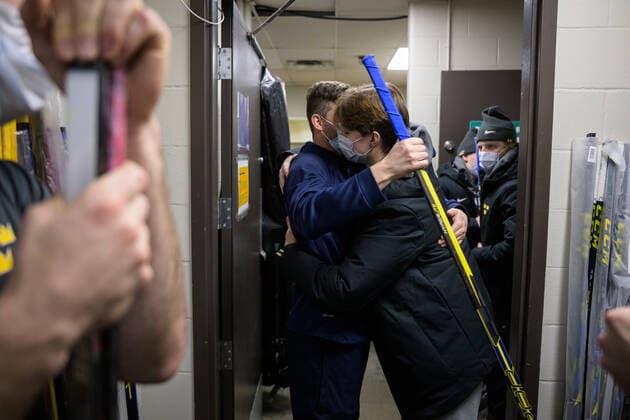 211229 Doctor Ryan Allenby and Daniel Ljungman of Sweden hug each other after the 2022 IIHF World Junior Championship was cancelled due to the coronavirus pandemic on December 29, 2021 in Red Deer Photo Joel Marklund BILDBYRAN kod JM JM0253 bbeng ishockey ice hockey jvm junior vm u20 2022 iihf world junior championship world juniors sverige sweden covid 19,  Copyright: JOELxMARKLUND BB211229JM050