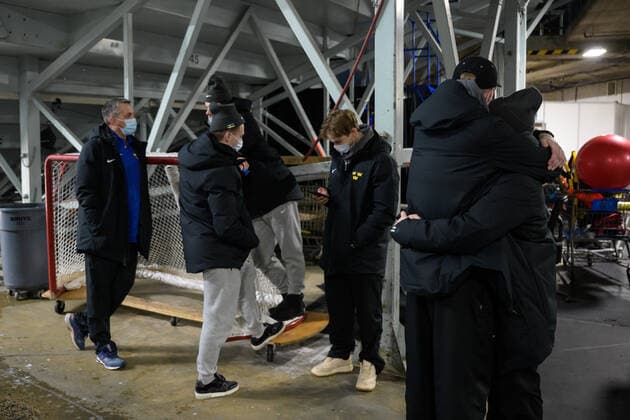 211229 Goaltender Calle Clang and Zion Nybeck of Sweden hug each other after the 2022 IIHF World Junior Championship was cancelled due to the coronavirus pandemic on December 29, 2021 in Red Deer Photo Joel Marklund BILDBYRAN kod JM JM0253 bbeng ishockey ice hockey jvm junior vm u20 2022 iihf world junior championship world juniors sverige sweden covid 19,  Copyright: JOELxMARKLUND BB211229JM059