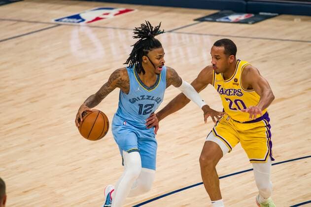 Sport Bilder des Tages Grizzlies point guard Ja Morant (12) in the 1st half of the game against the Lakers, at FedEx Forum in Memphis, Tennessee, US, 29 December 2021. Lakers at Memphis Grizzlies Basketball !ACHTUNG: NUR REDAKTIONELLE NUTZUNG!  Copyright: xMATTHEWxA.xSMITHx AME6668 20211230-7830abfa38e58145dd896cad961cc5f616247a90