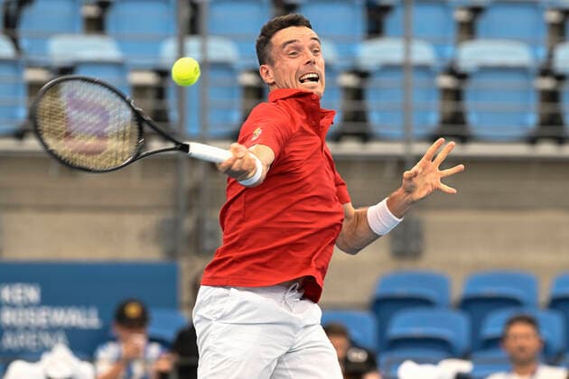 1st January 2022; Ken Rosewall Arena, Sydney, New South Wales, Australia; ATP, Tennis Herren Cup Australia, Sydney, Day 1 Chile versus Spain; Roberto Bautista Agut of Spain hits a midcourt volley to Cristian Garin of Chile  ActionPlus12351889 NigelxOwen