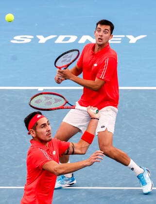 TENNIS ATP, Tennis Herren CUP, Tomas Barrios Vera (R) and Alejandro Tabilo of Team Chile prepare to hit the ball during their doubles match against Alejandro Davidovich Fokina and Pedro Martinez of Team Spain during Day 1 of the ATP Cup tournament at Ken Rosewall Arena in Sydney, Saturday, January 1, 2022. ( NO ARCHIVING, EDITORIAL USE ONLY, NO USE IN BOOKS WITHOUT CONSENT SYDNEY NSW AUSTRALIA  Copyright: xDAVIDxGRAYx 20220101001610109273