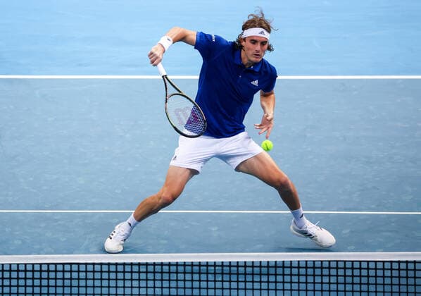 TENNIS ATP, Tennis Herren CUP, Stefanos Tsitsipas of Team Greece hits a shot during a doubles match against Team Poland during Day 1 of the ATP Cup tournament at Ken Rosewall Arena in Sydney, Saturday, January 1, 2022. ( NO ARCHIVING, EDITORIAL USE ONLY, NO USE IN BOOKS WITHOUT CONSENT SYDNEY NSW AUSTRALIA  Copyright: xDAVIDxGRAYx 20220101001610131306