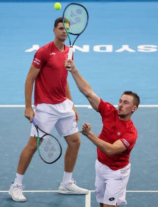 TENNIS ATP, Tennis Herren CUP, Hubert Hurkacz and Jan Zielinski of Team Poland play during their match against Stefanos Tsitsipas and Michail Pervolarakis of Team Greece during Day 1 of the ATP Cup tournament at Ken Rosewall Arena in Sydney, Saturday, January 1, 2022. ( NO ARCHIVING, EDITORIAL USE ONLY, NO USE IN BOOKS WITHOUT CONSENT SYDNEY NSW AUSTRALIA  Copyright: xDAVIDxGRAYx 20220101001610131323