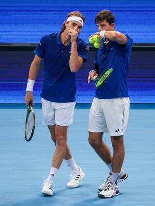 TENNIS ATP, Tennis Herren CUP, Stefanos Tsitsipas and Michail Pervolarakis of Team Greece talk during their doubles match against Hubert Hurkacz and Jan Zielinski of Team Poland during Day 1 of the ATP Cup tournament at Ken Rosewall Arena in Sydney, Saturday, January 1, 2022. ( NO ARCHIVING, EDITORIAL USE ONLY, NO USE IN BOOKS WITHOUT CONSENT SYDNEY NSW AUSTRALIA  Copyright: xDAVIDxGRAYx 20220101001610131408