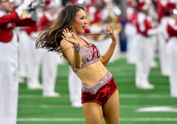 December 31, 2021: Baton twirlers perform before the Cotton Bowl Classic Football Game between the University of Cincinnati Bearcats and the University of Alabama Crimson Tide at AT&T Stadium in Arlington, TX Alabama defeated Cincinnati 27-6 CSM Dallas USA - ZUMAcp2_ 20211231_zaf_cp2_028 Copyright: xAlbertxPenax
