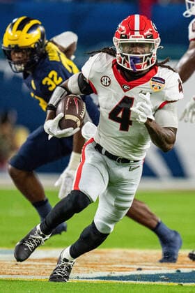 Georgia Bulldogs running back James Cook (4) runs with the ball during the Capital One Orange Bowl NCAA, College League, USA College Football Playoff game between Georgia and Michigan on Friday December 31, 2021 at Hard Rock Stadium in Miami Gardens, FL. CSM Miami Gardens United States of America - ZUMAc04_ 20211231_zaf_c04_115 Copyright: xJacobxKupfermanx