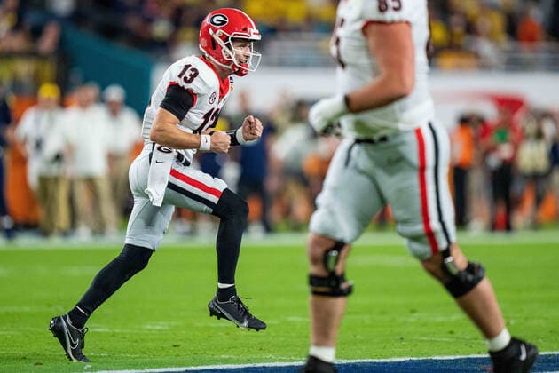Georgia Bulldogs quarterback Stetson Bennett (13) celebrates during the Capital One Orange Bowl NCAA, College League, USA College Football Playoff game between Georgia and Michigan on Friday December 31, 2021 at Hard Rock Stadium in Miami Gardens, FL. CSM Miami Gardens United States of America - ZUMAc04_ 20211231_zaf_c04_118 Copyright: xJacobxKupfermanx