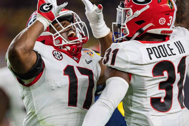 Georgia Bulldogs linebacker Nakobe Dean (17) celebrates with defensive back William Poole (31) during the Capital One Orange Bowl NCAA, College League, USA College Football Playoff game between Georgia and Michigan on Friday December 31, 2021 at Hard Rock Stadium in Miami Gardens, FL. CSM Miami Gardens United States of America - ZUMAc04_ 20211231_zaf_c04_125 Copyright: xJacobxKupfermanx