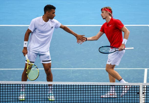 TENNIS ATP, Tennis Herren CUP, Denis Shapovalov (R) and Felix Auger-Aliassime of Team Canada react during their doubles match against Taylor Fritz and John Isner of Team USA on day 2 of the ATP Cup tennis tournament at Qudos Arena in Sydney, Sunday, January 2, 2022. ( NO ARCHIVING, EDITORIAL USE ONLY, NO USE IN BOOKS WITHOUT CONSENT SYDNEY NSW AUSTRALIA  Copyright: xDAVIDxGRAYx 20220102001610291068