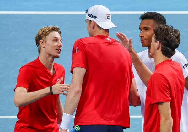 TENNIS ATP, Tennis Herren CUP, Taylor Fritz (R) and John Isner (2nd L) of Team USA shake hands with Denis Shapovalov (L) and Felix Auger-Aliassime of Team Canada after their doubles match on day 2 of the ATP Cup tennis tournament at Qudos Arena in Sydney, Sunday, January 2, 2022. ( NO ARCHIVING, EDITORIAL USE ONLY, NO USE IN BOOKS WITHOUT CONSENT SYDNEY NSW AUSTRALIA  Copyright: xDAVIDxGRAYx 20220102001610291167