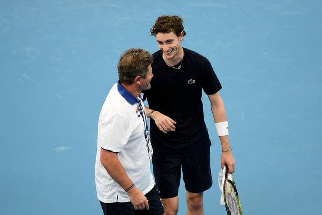SYDNEY, AUSTRALIA - JANUARY 02: Ugo Humbert of France and team captain Nicolas Copin after the ATP, Tennis Herren Cup Tennis match between Daniil Medvedev of Russia and Ugo Humbert of France at Ken Rosewall Arena on January 02, 2022 in Sydney, Australia. (Photo by Steven Markham Icon Sportswire) TENNIS: JAN 02 ATP Cup Sydney Icon2201020130