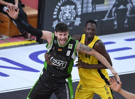 Basketball 2 Bundesliga 2020 2021 17 matchday at Paul Horn Arena Tigers Tuebingen ROEMERSTROM Gladiators Trier 02 01 2021 Enosch Wolf li, Trier vs Bakary Dibba re, Tigers