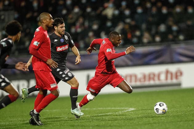 Kevin Volland (AS Monaco) vs Alassane Diaby (Quevilly-Rouen) FOOTBALL : 16e finale de la Coupe de France - Quevilly-Rouen vs AS Monaco - 02 01 2022 AurelienMorissard Panoramic 