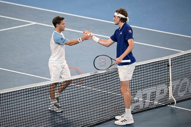 3rd January 2022: Ken Rosewall Arena, Sydney Olympic Park, Sydney, Australia; ATP, Tennis Herren Cup tennis tournament, Day 3 Greece versus Argentina; Diego Schwartzman of Team Argentina and Stefanos Tsitsipas of Team Greece shakes hands after their match which Schwartzman won 2-1  ActionPlus12352921 NigelxOwen