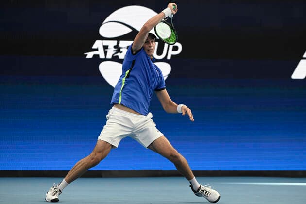 3rd January 2022: Ken Rosewall Arena, Sydney Olympic Park, Sydney, Australia; ATP, Tennis Herren Cup tennis tournament, Day 3 Greece versus Argentina; Michail Pervolarakis of Team Greece follows through on his shot in his tie against Federico Delbonis of Team Argentina  ActionPlus12352833 NigelxOwen