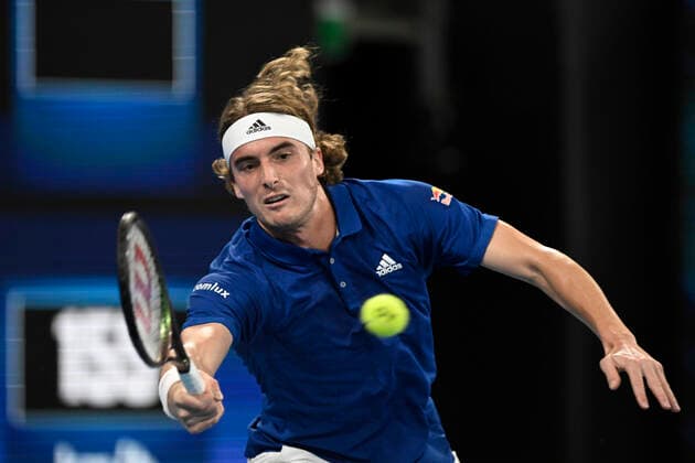 3rd January 2022: Ken Rosewall Arena, Sydney Olympic Park, Sydney, Australia; ATP, Tennis Herren Cup tennis tournament, Day 3 Greece versus Argentina; Stefanos Tsitsipas of Team Greece stretches to reach the ball in his match against Diego Schwartzman of Team Argentina  ActionPlus12352866 NigelxOwen