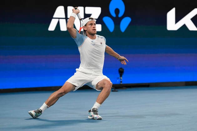 3rd January 2022: Ken Rosewall Arena, Sydney Olympic Park, Sydney, Australia; ATP, Tennis Herren Cup tennis tournament, Day 3 Greece versus Argentina; Diego Schwartzman of Team Argentina follows through on his shot in his tie against Stefanos Tsitsipas of Team Greece  ActionPlus12352895 NigelxOwen
