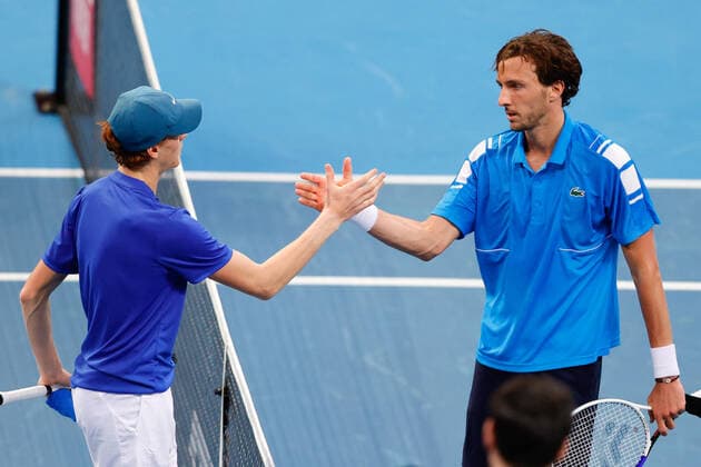 Jannik Sinner of Team Italy shakes the hand of Arthur Rinderknech of Team France during the ATP, Tennis Herren Cup at Qudos Bank Arena, Sydney Olympic Park Tennis Centre, Sydney, Australia on 4 January 2022. Copyright: xPeterxDovganx 30460209