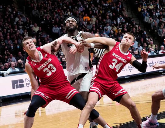January 3, 2022:Wisconsin Badgers center Chris Vogt (33) and guard Brad Davison (34) block Purdue Boilermakers forward Trevion Williams (50) a the free throw line in the 2nd half of the game between the Wisconsin Badgers and the Purdue Boilermakers at Mackey Arena in West Lafayette, Indiana. Mandatory Credit: Sandra Dukes CSM. West Lafayette USA - ZUMAc04_ 20220103_zaf_c04_010 Copyright: xSandraxDukes xCalxSportxMediax