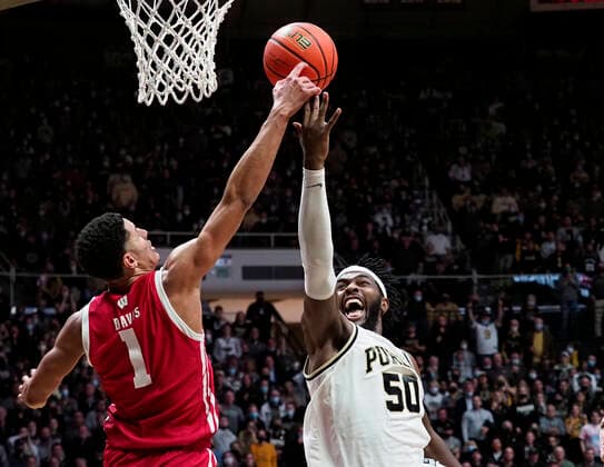 January 3, 2022: Purdue Boilermakers forward Trevion Williams (50) and Wisconsin Badgers guard Johnny Davis (1) go for a rebound in the 2nd half of the game between the Wisconsin Badgers and the Purdue Boilermakers at Mackey Arena in West Lafayette, Indiana. Mandatory Credit: Sandra Dukes CSM. West Lafayette USA - ZUMAc04_ 20220103_zaf_c04_011 Copyright: xSandraxDukes xCalxSportxMediax