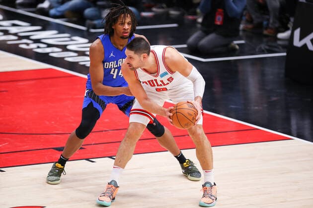 CHICAGO, IL - JANUARY 03: Orlando Magic Center Freddie Gillespie (44) posts up against Chicago Bulls Center Nikola Vucevic (9) during a NBA, Basketball Herren, USA game between the Orlando Magic and the Chicago Bulls on January 3, 2022 at the United Center in Chicago, IL. (Photo by Melissa Tamez Icon Sportswire) NBA: JAN 03 Magic at Bulls Icon22010327