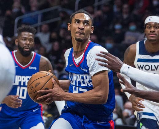 January 3, 2022, Los Angeles, California, USA: Keon Johnson 45 of the Los Angeles Clippers puts up a shot during their NBA, Basketball Herren, USA game against the Minnesota Timberwolves on Monday January 3, 2022 at Crypto.com Arena in Los Angeles, California. Clippers lose to Timberwolves, 104-122. PI Los Angeles USA - ZUMAp124 20220103_zaa_p124_016 Copyright: xJAVIERxROJASx