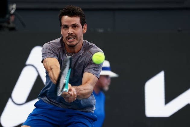 ADELAIDE, AUSTRALIA - JANUARY 04: Alex Bolt of Australia plays a backhand during the ATP, Tennis Herren singles match between Juan Manuel Cerundolo of Argentina and Alex Bolt of Australia on day two of the Adelaide International tennis tournament at Memorial Drive on January 04, 2022 in Adelaide, Australia. (Photo by Peter Mundy Speed Media Icon Sportswire) TENNIS: JAN 04 - Adelaide International Icon220104161