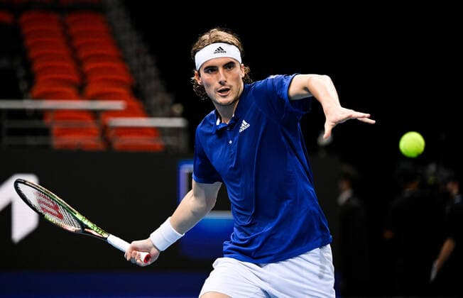 TENNIS ATP, Tennis Herren CUP, Stefanos Tsitsipas of Team Greece in action against Nikoloz Basilashvili of Team Georgia in his match against on Day 5 of the ATP Cup tennis tournament at the Qudos Bank Arena in Sydney, Wednesday, January 5, 2022. ( NO ARCHIVING, EDITORIAL USE ONLY, NO USE IN BOOKS WITHOUT CONSENT SYDNEY NSW AUSTRALIA  Copyright: xJAMESxGOURLEYx 20220105001610956937