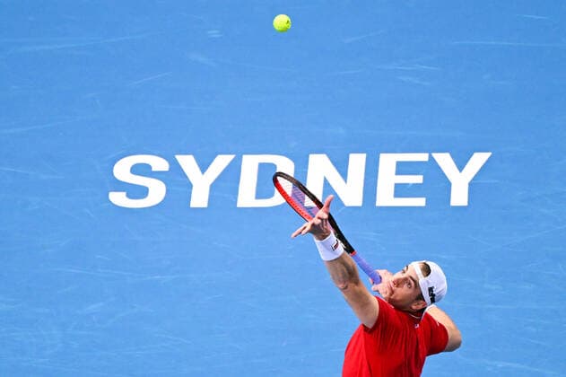 Mandatory Credit: Photo by James Gourley Shutterstock (12709936ac) John Isner of Team USA serves during his ATP, Tennis Herren Cup Group Match against Team Great Britain ATP Cup, Tennis, Qudos Bank Arena, Sydney, Australia - 06 Jan 2022 ATP Cup, Tennis, Qudos Bank Arena, Sydney, Australia - 06 Jan 2022  Copyright: xJamesxGourley Shutterstockx 12709936ac