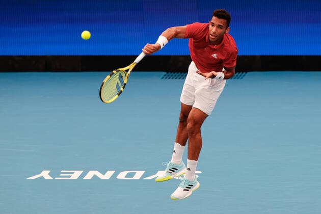Felix Auger-Aliassime of Team Canada serves to Daniil Medvedev of Team Russia during the ATP, Tennis Herren Cup Semi Final at Sydney Olympic Park Tennis Centre, Sydney, Australia on 8 January 2022. Copyright: xPeterxDovganx 30460519