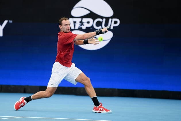 SYDNEY, AUSTRALIA - JANUARY 08: Roman Safiullin of Russia plays a backhand during the ATP, Tennis Herren Cup Tennis semifinal match between Roman Safiullin of Russia and Denis Shapovalov of Canada at Ken Rosewall Arena on January 08, 2022 in Sydney, Australia. (Photo by Steven Markham Icon Sportswire) TENNIS: JAN 08 ATP Cup Sydney Icon2201080226