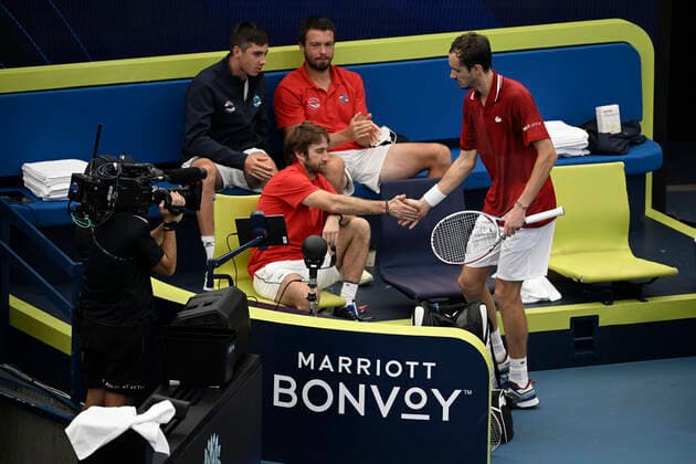 8th January 2022: Ken Rosewall Arena, Sydney Olympic Park, Sydney, Australia; ATP, Tennis Herren Cup tennis tournament, Semi Final Canada versus Russia; Gilles Cervara captain of Team Russia shakes hands with Daniil Medvedev of Team Russia as he closes in on victory  ActionPlus12354294 NigelxOwen