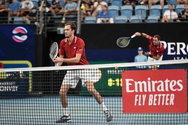 8th January 2022: Ken Rosewall Arena, Sydney Olympic Park, Sydney, Australia; ATP, Tennis Herren Cup tennis tournament, Semi Final Canada versus Russia; Daniil Medvedev is at the net as Roman Safiullin of Team Russia serves in their doubles match against Denis Shapovalov and Felix Auger-Aliassime of Team Canada  ActionPlus12354325 NigelxOwen