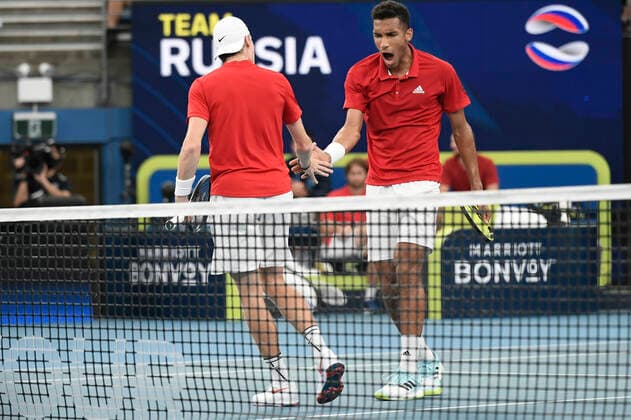 8th January 2022: Ken Rosewall Arena, Sydney Olympic Park, Sydney, Australia; ATP, Tennis Herren Cup tennis tournament, Semi Final Canada versus Russia; Denis Shapovalov wins the point and celebrates with Felix Auger-Aliassime of Team Canada in their doubles match against Daniil Medvedev and Roman Safiullin of Team Russia  ActionPlus12354334 NigelxOwen