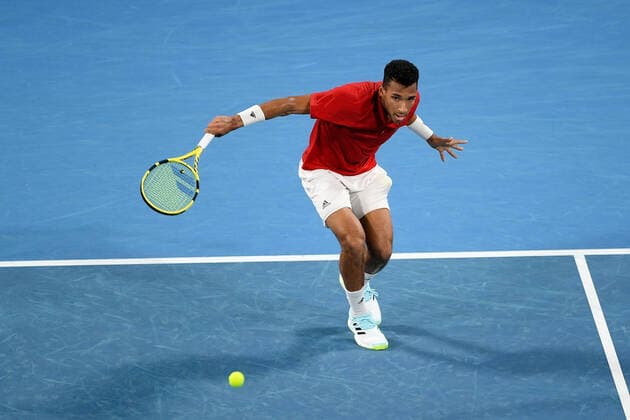 SYDNEY, AUSTRALIA - JANUARY 09: FÃ lix Auger-Aliassime of Canada plays a backhand during the ATP, Tennis Herren Cup Tennis Final match between FÃ lix Auger-Aliassime of Canada and Roberto Bautista Agut of Spain at Ken Rosewall Arena on January 09, 2022 in Sydney, Australia. (Photo by Steven Markham Icon Sportswire) TENNIS: JAN 09 ATP Cup Sydney Icon2201090096