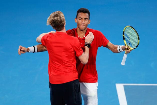 Felix Auger-Aliassime of Team Canada celebrates with Denis Shapovalov of Team Canada after defeating Roberto Bautista Agut of Team Spain and winning the ATP, Tennis Herren Cup Final at Ken Rosewall Arena, Sydney Olympic Park, Sydney, Australia on 9 January 2022. Copyright: xPeterxDovganx 30460617