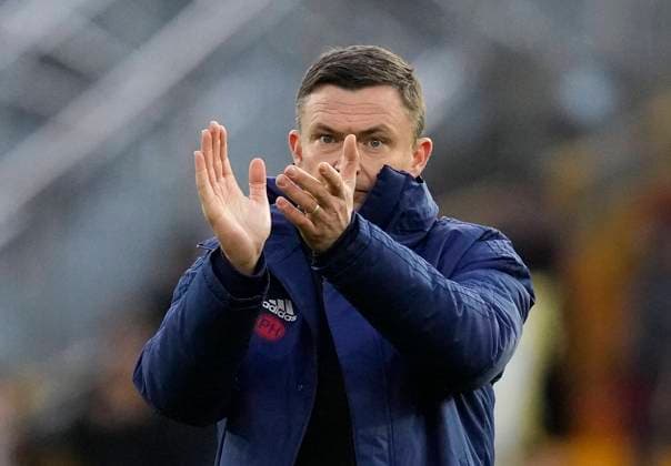 Fußball, Trainerhistorie Sheffield United von 1889 bis heute Wolverhampton, England, 9th January 2022. Paul Heckingbottom manager of Sheffield Utd applauds the fans during the Emirates FA Cup match at Molineux, Wolverhampton. Picture credit should read: Andrew Yates Sportimage EDITORIAL USE ONLY. No use with unauthorised audio, video, data, fixture lists, club league logos or live services. Online in-match use limited to 120 images, no video emulation. No use in betting, games or single club league player publications. SPI-1457-0058