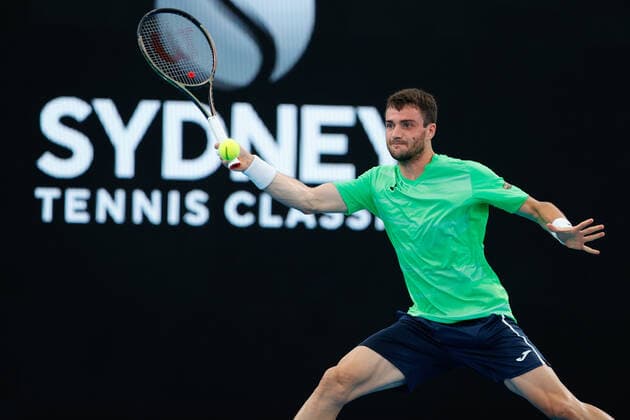 Pedro Martinez of Spain plays a forehand against Alexei Popyrin of Australia during the Sydney Tennis Classic 2022 at Sydney Olympic Park Tennis Centre, Sydney, Australia on 11 January 2022. Copyright: xPeterxDovganx 30470074