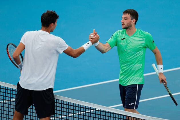 Pedro Martinez of Spain congratulates Alexei Popyrin of Australia in the first round during the Sydney Tennis Classic 2022 at Sydney Olympic Park Tennis Centre, Sydney, Australia on 11 January 2022. Copyright: xPeterxDovganx 30470083
