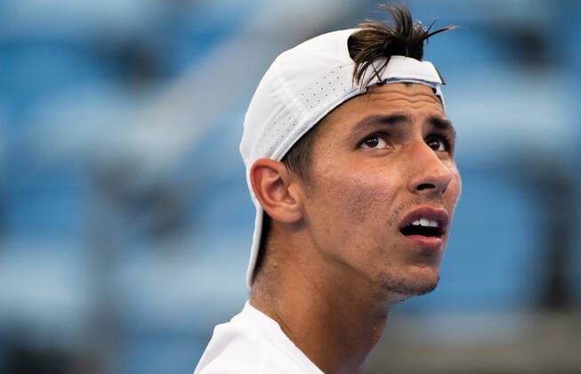 SYDNEY TENNIS CLASSIC, Alexei Popyrin of Australia looks dejected during his First Round match against Pedro Martinez of Spain on Day 2 of the Sydney Tennis Classic at Ken Rosewall Arena, in Sydney, Tuesday, January 11, 2022. ( NO ARCHIVING, EDITORIAL USE ONLY, NO USE IN BOOKS WITHOUT CONSENT SYDNEY NSW AUSTRALIA  Copyright: xJAMESxGOURLEYx 20220111001612477577