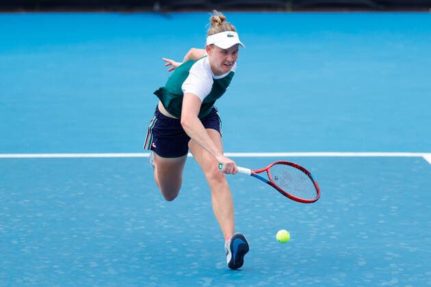 Fiona Ferro of France runs to the net against Elise Mertens of Belgium during the first round Sydney Tennis Classic 2022 at Sydney Olympic Park Tennis Centre, Sydney, Australia on 11 January 2022. Copyright: xPeterxDovganx 30470094