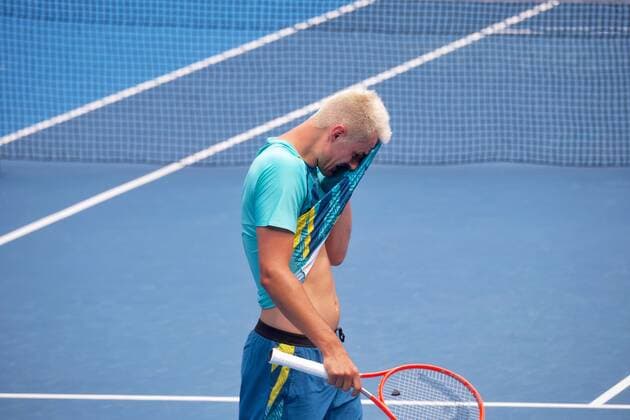 TENNIS AUSTRALIAN OPEN QUALIFIER, Australia?s Bernard Tomic is seen in action during his match against Russia?s Roman Safiullin during their Open Qualifying match at Kia Arena in Melbourne Park, Melbourne, Tuesday, January 11, 2022. ( NO ARCHIVING, EDITORIAL USE ONLY, NO USE IN BOOKS WITHOUT CONSENT Melbourne VIC AUSTRALIA  Copyright: xLUISxASCUIx 0147007340st