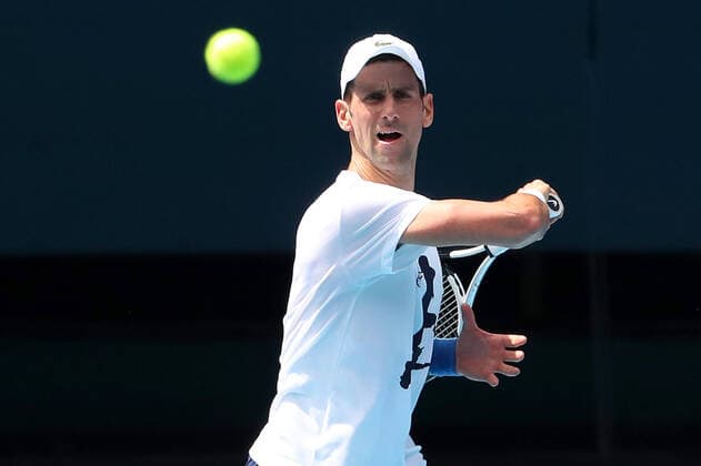 Sport Bilder des Tages TENNIS AUSTRALIAN OPEN PRACTICE, Novak Djokovic of Serbia during a practice session ahead of the Australian Open, Melbourne Park, in Melbourne, Tuesday, January 11, 2022. ( NO ARCHIVING, EDITORIAL USE ONLY, NO USE IN BOOKS WITHOUT CONSENT MELBOURNE VIC AUSTRALIA  Copyright: xKELLYxDEFINAx 20220111001612526695
