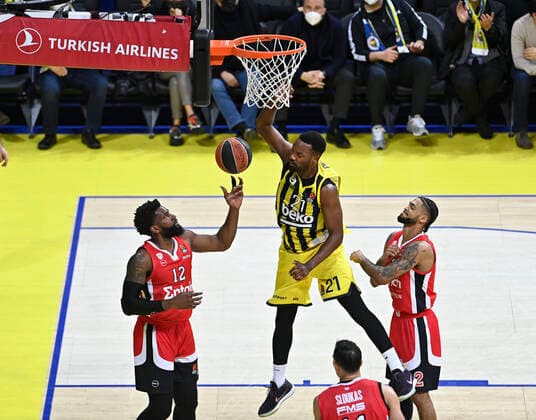 Dyshawn Pierre of Fenerbahce Beko Istanbul and Hassan Martin (12) , Tyler Dorsey (R) of Olympiacos Piraeus during the Turkish Airlines Euroleague Basketball match between Fenerbahce Beko Istanbul and Olympiacos Piraeus at Ulker Arena in Istanbul , Turkey on January 11, 2022. ( Photo : Seskimphoto ) 