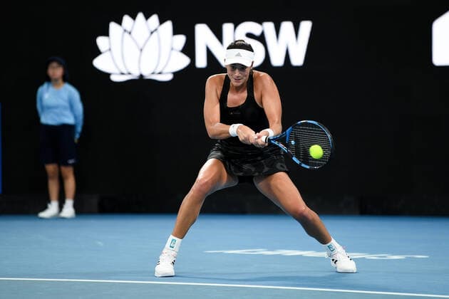 SYDNEY, AUSTRALIA - JANUARY 12: Garbine Muguruza of Spain plays a backhand during the Sydney Classic Tennis match between Garbine Muguruza of Spain and Ekaterina Alexandrova of Russia at Ken Rosewall Arena on January 12, 2022 in Sydney, Australia. (Photo by Steven Markham Icon Sportswire) TENNIS: JAN 12 Sydney Classic Icon2201120121