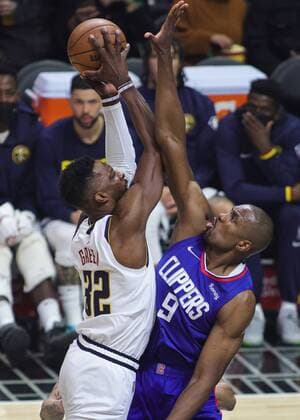 Jeff Green (L) of the Nuggets and Serge Ibaka of the Clippers jump for a ball during an NBA, Basketball Herren, USA game between the Los Angeles Clippers and the Denver Nuggets, at the Crypto.com Arena in Los Angeles (United States). Los Angeles Clippers vs Denver Nuggets !ACHTUNG: NUR REDAKTIONELLE NUTZUNG!  Copyright: xPhillipxKimx AME8447 20220112-103e6ae9e861a9e175756f57428d3e7702c3c85a