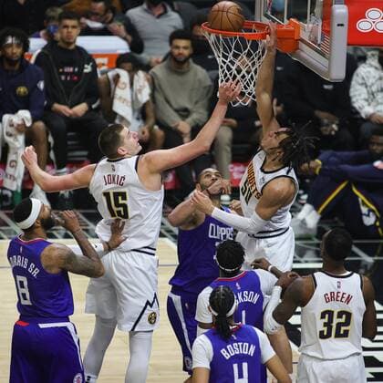 Aaron Gordon (R) of the Nuggets jumps to the basket to save a point alongside teammate Nikola Jokic (L), during an NBA, Basketball Herren, USA game between the Los Angeles Clippers and the Denver Nuggets, at the Crypto.com Arena in Los Angeles (United States). Los Angeles Clippers vs Denver Nuggets !ACHTUNG: NUR REDAKTIONELLE NUTZUNG!  Copyright: xPhillipxKimx AME8450 20220112-6ba4726add1416b8c394b8e076e1e3cffeaad2ed