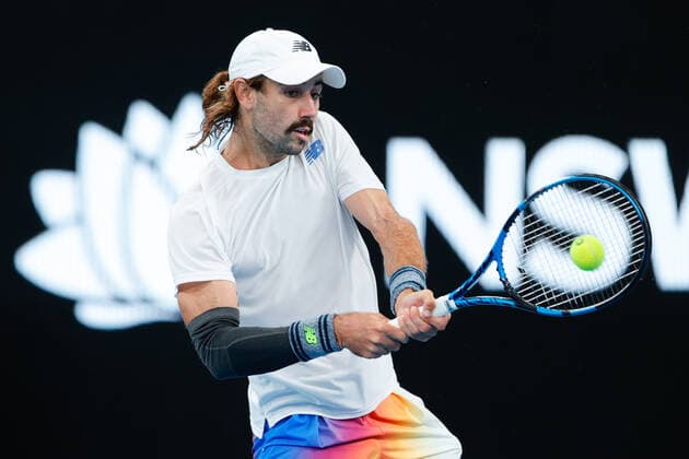 Jordan Thompson of Australia plays a backhand against Reilly Opelka of USA during the Round of 16 match at the Sydney Tennis Classic 2022 at Sydney Olympic Park Tennis Centre, Sydney, Australia on 12 January 2022. Copyright: xPeterxDovganx 30470271