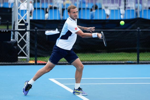 Dan Evans of Great Britain hits a forehand against Pedro Martinez of Spain during the Round of 16 match at the Sydney Tennis Classic 2022 at Sydney Olympic Park Tennis Centre, Sydney, Australia on 12 January 2022. Copyright: xPeterxDovganx 30470290
