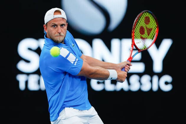Denis Kudla of USA hits a backhand against David Goffin of Belgium during the Sydney Tennis Classic 2022 at Sydney Olympic Park Tennis Centre, Sydney, Australia on 12 January 2022. Copyright: xPeterxDovganx 30470293